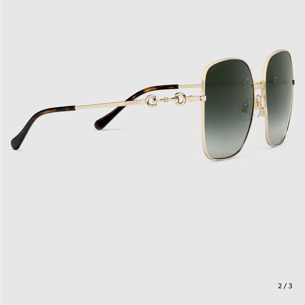 Gucci Women's Sunglasses with Gold Frame and Black Temples. Never worn.